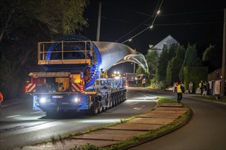 Transport of a 68 metre long, 22 tonne blade of a wind turbine, here in Schwelm, with a