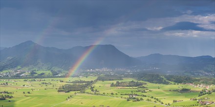 Panorama from Grünten over the Illertal with rainbow to Blaichach and Immenstadt, behind