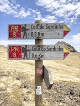 Signpost for the PR 8 hiking trail on the Vereda Ponta de São Lourenço, Caniçal, Madeira, Portugal,