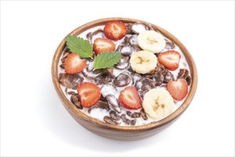 Chocolate cornflakes with milk and strawberry in wooden bowl isolated on white background. Side