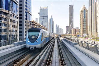 Dubai Metro public transport train at the Burj Khalifa Dubai Mall stop in Dubai, United Arab