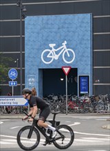 Cyclists on cycle paths, bicycle parking garage at the Fisketorvet shopping centre, Sydhavnen, in