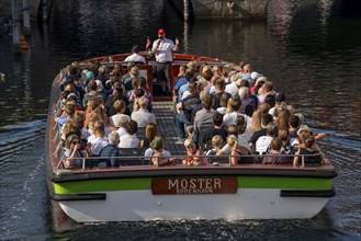 Harbour cruise in an open canal cruise boat, Copenhagen, Denmark, Europe