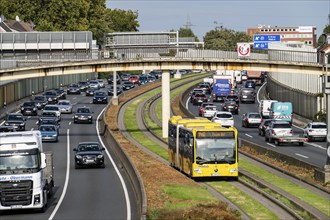 Traffic jam on the A40 motorway, Ruhr expressway, bus lane in the middle of the carriageway, public