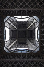 View from below of the impressive metal construction, Eiffel Tower, seen from below, mouse