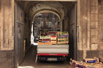 Fruit, vegetables, cheese and meat at the historic market in Catania, Sicily, Italy, Europe