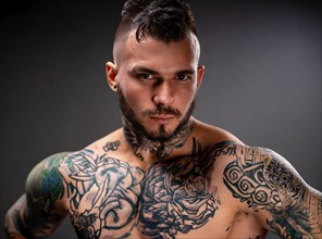 Muscular young man, with naked upper body and distinctive tattoos, tattoos, AI generated, AI