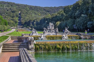 Fountain sculptures at the water basins in the garden of the royal palace Palazzo Reale, Italian