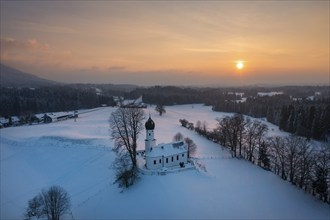 Sunset, Church of the Visitation of the Virgin Mary in winter, Oberbuchen, drone shot, Tölzer Land,