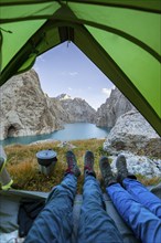 Wild camping, camping in the wilderness with a tent, Kol Suu mountain lake, Sary Beles Mountains,