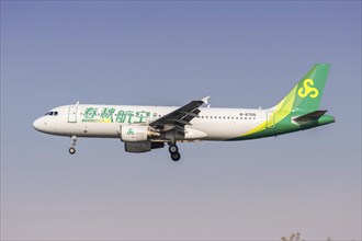 A Spring Airlines Airbus A320 aircraft with the registration number B-6705 at Hongqiao Airport