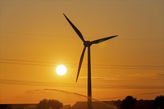 Sunset, wind power plant, field irrigation, silhouettes, Melbeck, Samtgemeinde Ilmenau, Lower