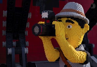 Photographer with camera built from Lego bricks, Lego photographer, life-size, Germany, logo,