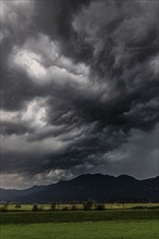 Dark storm clouds during a thunderstorm, storm, summer, mountain landscape, Loisach-Lake