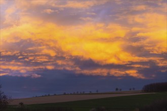 Dramatic evening sky over the Alte Poststraße between Possendorf and Golberode in the