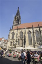 Street café and St. Lamberti Church, Münster, Münsterland, North Rhine-Westphalia, Germany, Europe