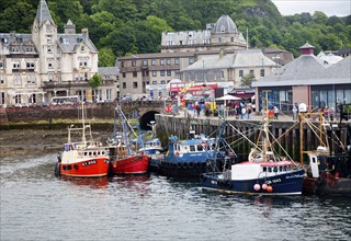 Fishing boats in the harbour at the town of Oban, Argyll and Bute, Scotland, UK