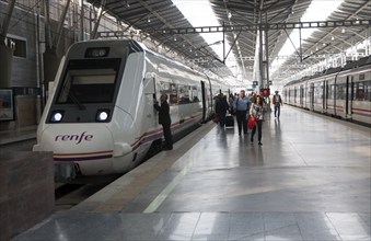 Train at platform inside María Zambrano railway station Malaga, Spain, Europe