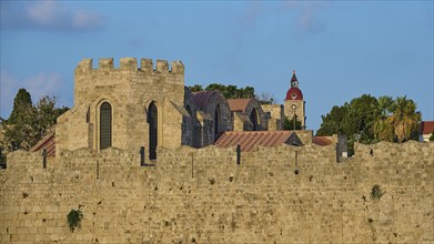 City wall, St Mary's Church, Clock tower, Historic stone walls of a medieval fortress with towers