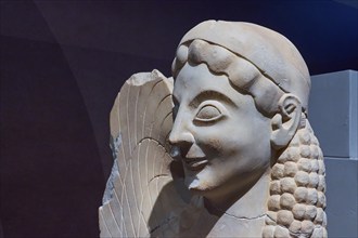 Marble Spinx, tomb, sculpture of a smiling ancient woman with stylised hair, Archaeological Museum,