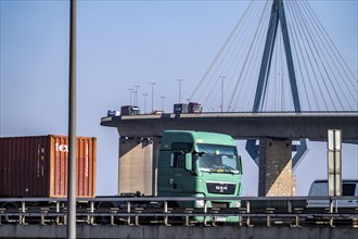 The Köhlbrand Bridge in the port of Hamburg, in front traffic on the A7 motorway, spans the 325 m