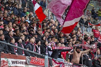 Kaiserslautern, 20.04.2024: The fans of SV Wehen Wiesbaden celebrate their team's draw after the