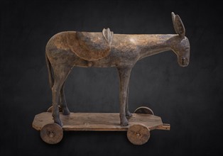 Palm donkey, wooden figure around 1380, painted on a dark background, Hohenzollerisches