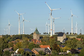 Wind farm above the village of Lichtenau, self-proclaimed energy town, houses with photovoltaic