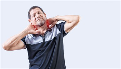 Neck pain and stress concept. Elderly person suffering with neck pain isolated. Mature man with