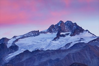 Colourful sky at sunset over the Aiguilles de Tour in the Savoie, France, Europe