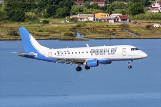 A Peoples Embraer 170 aircraft with the registration number OE-LMK at Corfu Airport, Greece, Europe