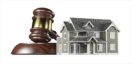 Wooden gavel and miniature house isolated on a white background