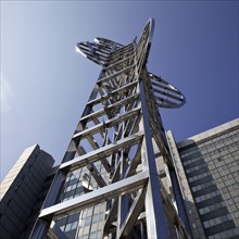 Sculpture by Nicolas Schöffer entitled Chronos 15, light-kinetic tower in front of the Stadthaus,