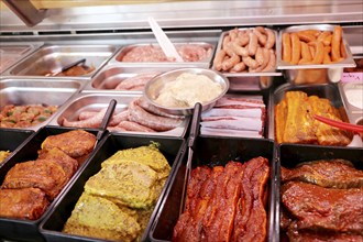 Variety of fine meat products in the butchery (Variety of fine meat products in the butchery)