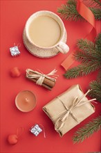 Christmas or New Year composition. Decorations, box, cinnamon, fir and spruce branches, cup of