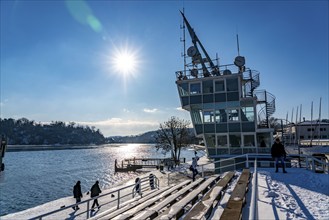 Winter in the Ruhr area, Lake Baldeney, snow-covered, partly frozen lake, regatta tower, grandstand