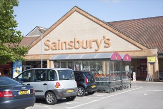 Cars parked at Sainsbury's supermarket store, Chippenham, Wiltshire, England, UK