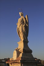 Angel San Rafael statue on Roman bridge Cordoba, Spain, Europe