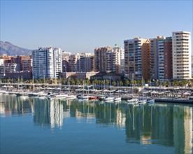 Apartment blocks and yachts in marina of Muelle Uno port development, city of Malaga, Spain, Europe