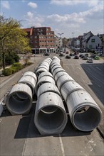 Concrete sewer pipes, stored on a construction site during sewer renovation work, on the Dickswall,