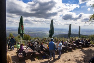 Hikers and mountain bikers enjoy the beautiful September weather on the Kalmit, the highest