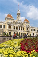 People on motorcycles in front of the Ho Chi Minh City Hall, Saigon, Vietnam, Asia