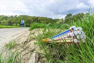 Fibre optic cable, freshly laid along a dirt road, provision of high-speed Internet in rural areas,