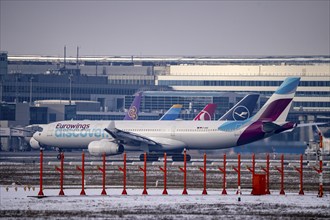 Eurowings Discover Airbus on the taxiway at Frankfurt FRA airport, Fraport, in winter, Hesse,