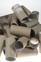 Pile, mountain of empty, used toilet paper rolls