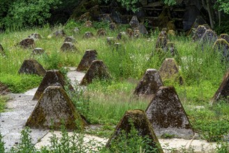 Remains of the Westwall across the Grölisbach, near Roetgen, 100 metre long anti-tank barrier