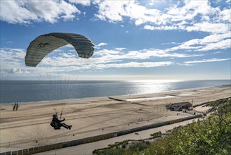 Paragliders along the dunes of Zoutelande, in Zeeland, South Holland, Netherlands