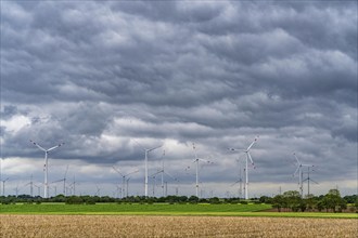 Wind farm east of Geilenkirchen, dark storm clouds, strong wind, North Rhine-Westphalia, Germany,