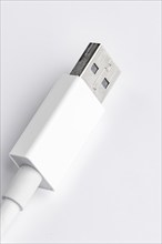 Close-up of a USB type A plug on a white background