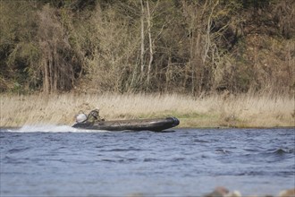 A Czech soldier crosses the Elbe in an inflatable boat as part of the military exercise 'Wettiner